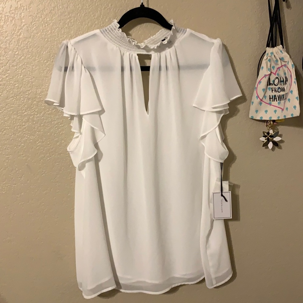 1 state white shirt.
